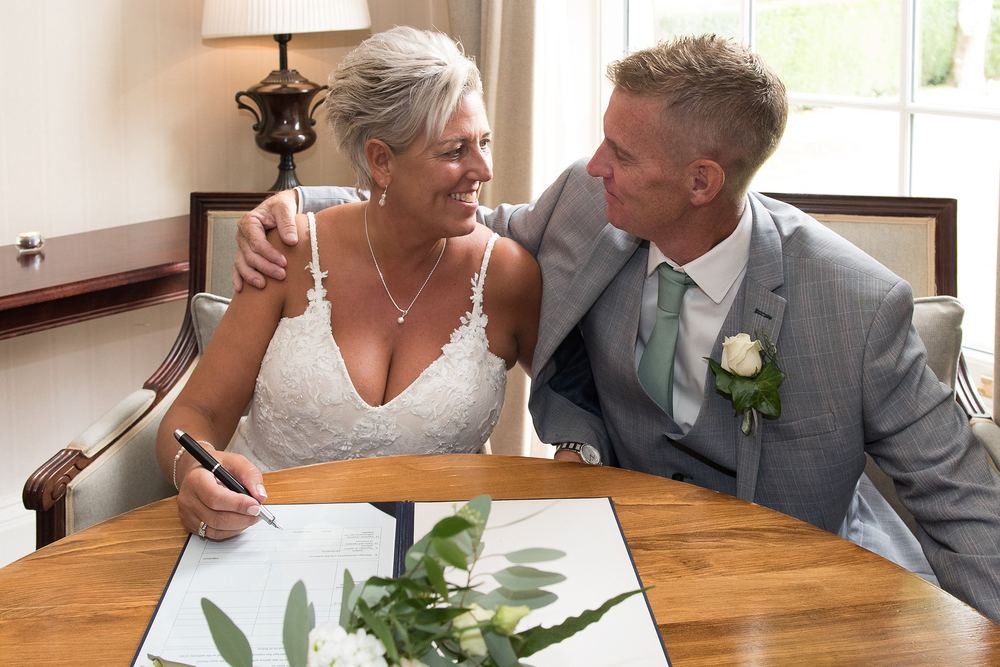 Helene & Rob sign the register at Burythorpe House, near Malton.