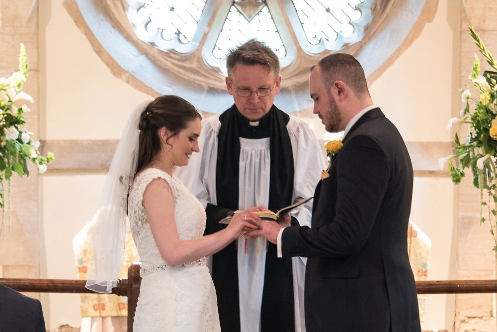 Laura & Bob's wedding ceremony at St Stephen's Church, Aldwark Manor, York.