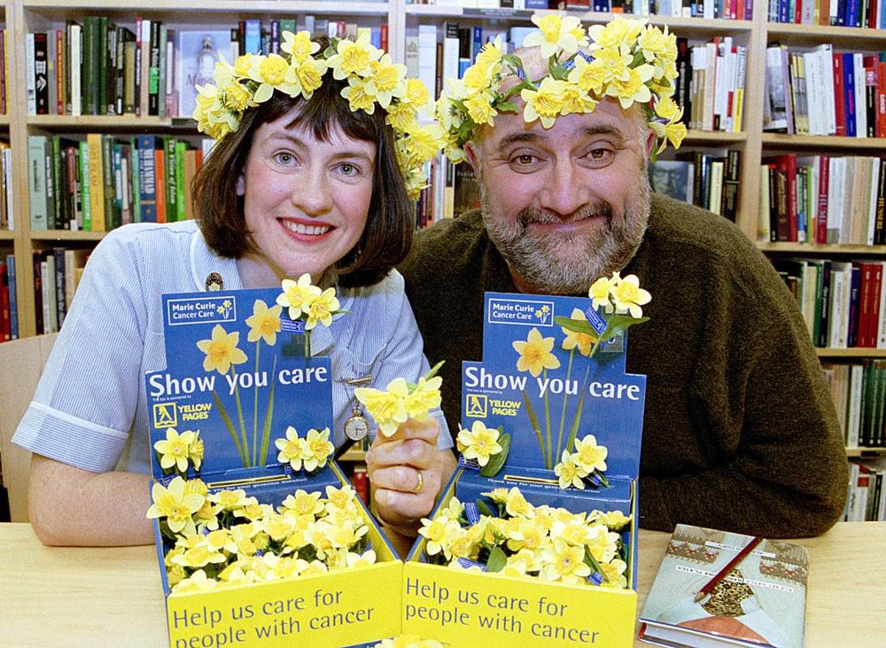 Alexei Sayle with a Marie Curie nurse.