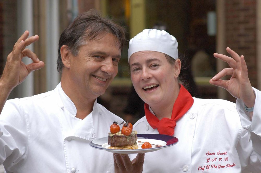Chef Raymond Blanc with a competing chef and a plated dish.