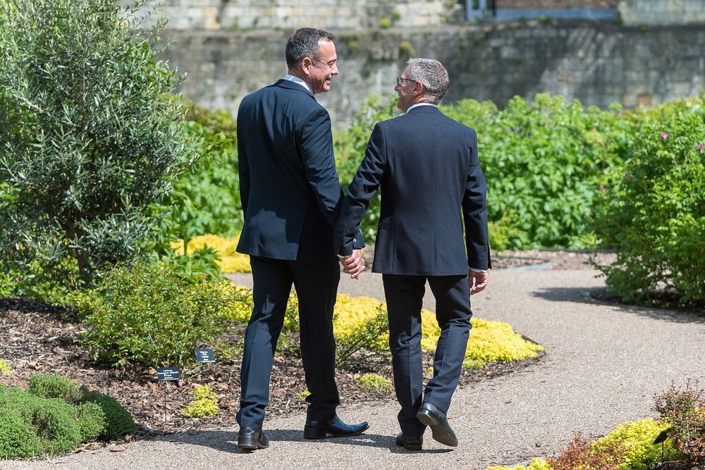 Roger & Mark take a quiet walk after their wedding in the Museum Gardens.