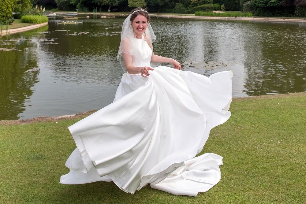 Georgina spins in her wedding dress at Burnby Hall Gardens, Pocklington.