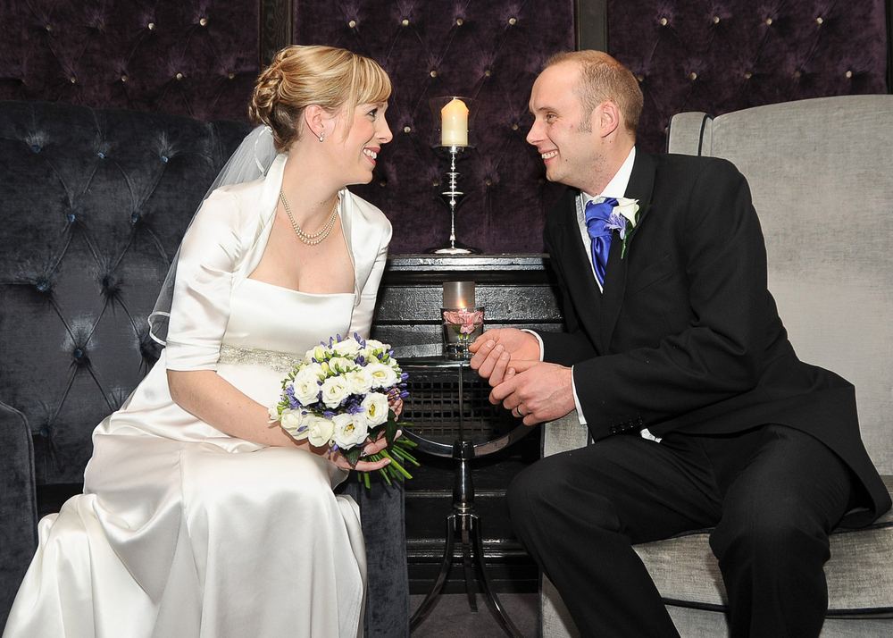 Rachel & Tom relax in The Grand Hotel lounge after their wedding.