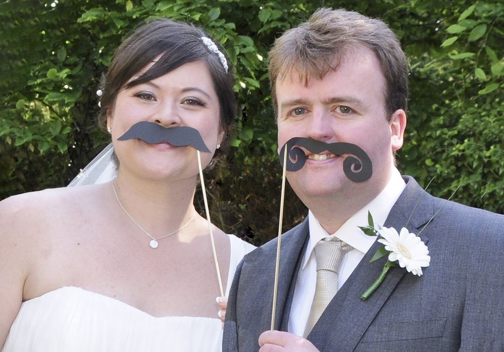 Tracy & Mark have wedding fun with fake moustaches at York Pavilion, Fulford.