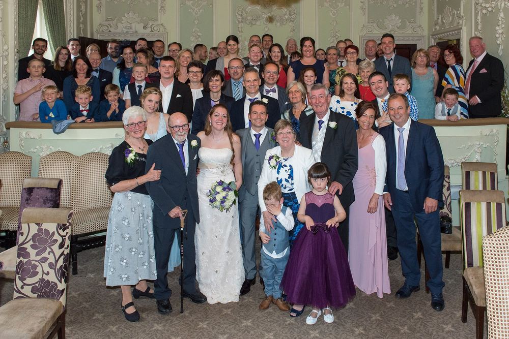 Geraldine & Simon's wedding group shot in the Byron Suite, The Bridge Hotel & Spa, Wetherby.
