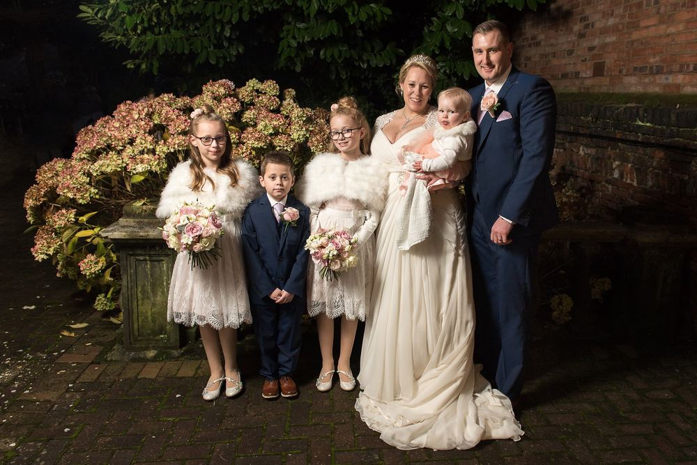Katie & Richard on their winter wedding day at York Register Office, with their children.