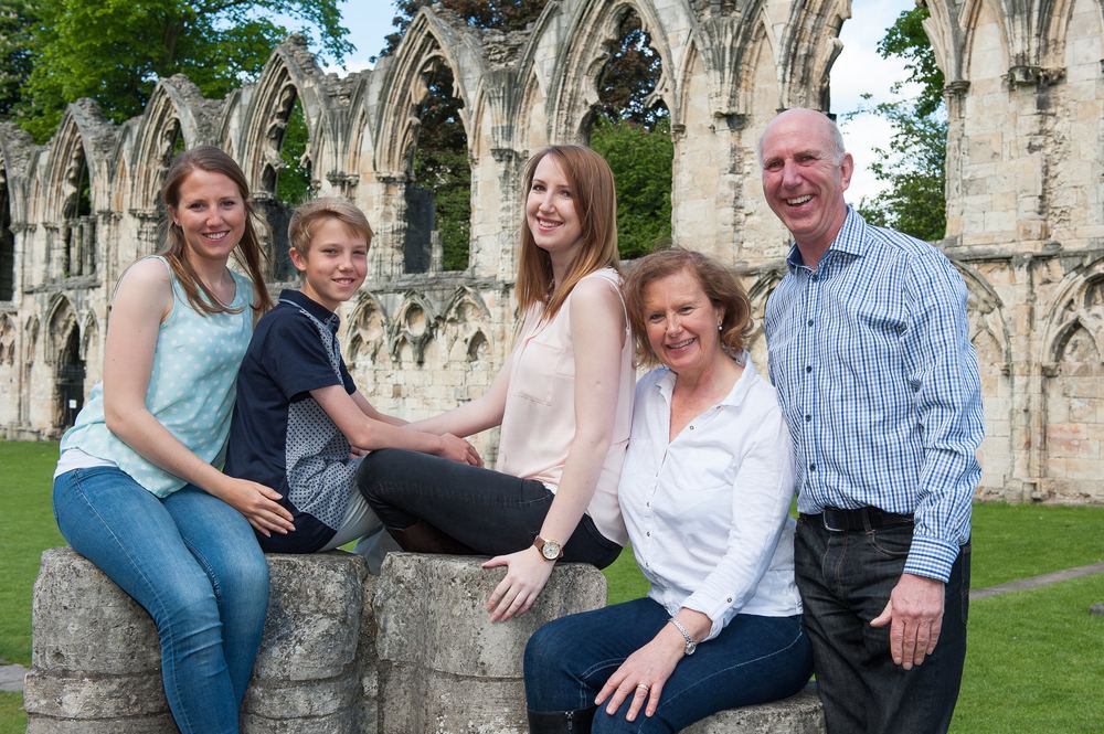 A family portrait in the Museum Gardens, with St Mary's Abbey behind them.
